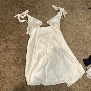 cream/white dress with gold detail